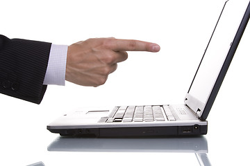 Image showing businessman pointing to the laptop