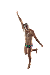 Image showing Professional male swimmer with hat and goggles in motion and action, healthy lifestyle and movement concept