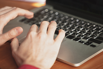 Image showing Caucasian entrepreneur, businessman, manager working in office, close up