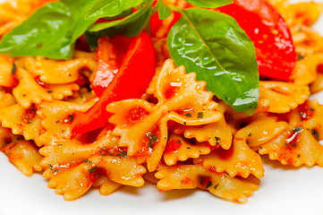 Image showing Italian pasta farfalle butterfly bow-tie and tomato sauce