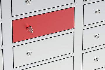 Image showing Key on the red bank safety deposit box