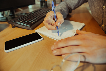 Image showing Man working from home during coronavirus or COVID-19 quarantine, remote office concept