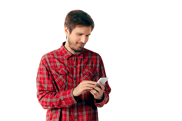 Image showing Man using smartphone isolated on white studio background