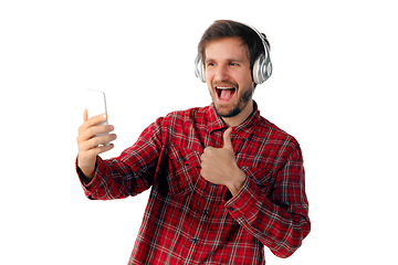 Image showing Man using smartphone isolated on white studio background