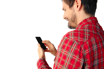 Image showing Close up of man using mobile smartphone isolated on white studio background