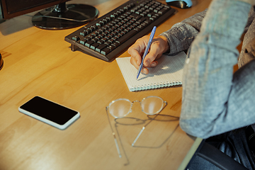 Image showing Man working from home during coronavirus or COVID-19 quarantine, remote office concept