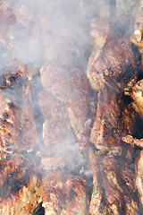 Image showing Cooking meat on grill