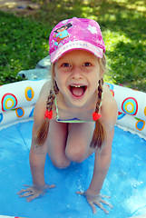 Image showing A girl in the children pool