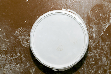 Image showing white can with paint repair
