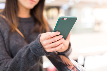 Image showing Young Woman using cellphone