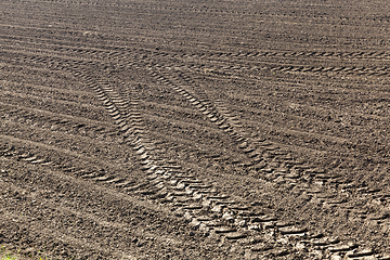 Image showing Plowed land with traces