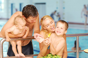 Image showing A family in the swimming pool