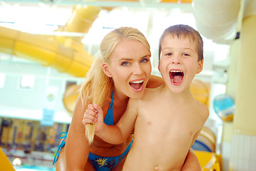 Image showing With the mother in the swimming pool