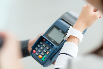 Image showing Woman using smart watch to pay