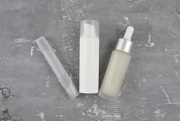 Image showing Cosmetic products on concrete