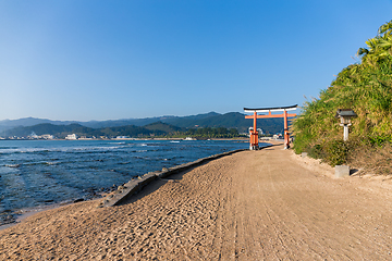 Image showing Red Torii in Aoshima Shrine with sunshine