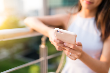 Image showing Woman using cellphone