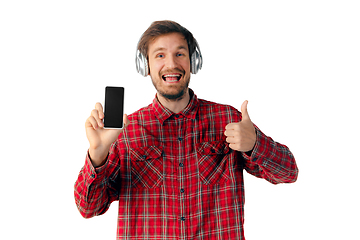 Image showing Man using smartphone isolated on white studio background