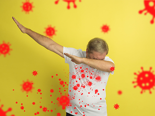 Image showing How to sneezing right - caucasian senior man dabbing, stop epidemic