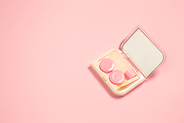 Image showing Soft and feminine. Monochrome stylish composition in pink color. Top view, flat lay.