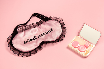 Image showing Sweet dreams. Monochrome stylish composition in pink color. Top view, flat lay.