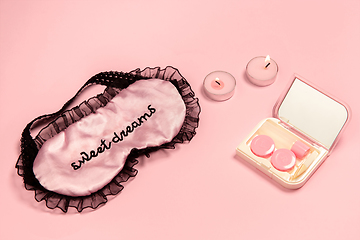Image showing Soft and feminine. Monochrome stylish composition in pink color. Top view, flat lay.