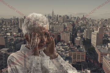 Image showing Stressed man holding head with hands on abstract city background. Double exposure. Virus alert, coronavirus pandemic.