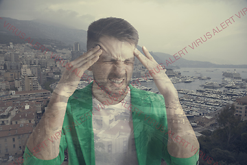 Image showing Stressed man holding head with hands on abstract city background. Double exposure. Virus alert, coronavirus pandemic.