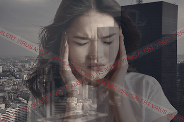 Image showing Stressed woman holding head with hands on abstract city background. Double exposure. Virus alert, coronavirus pandemic.