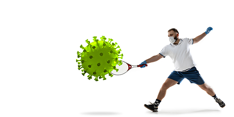 Image showing Sportsman kicking, punching coronavirus, protection and treatment concept, flyer