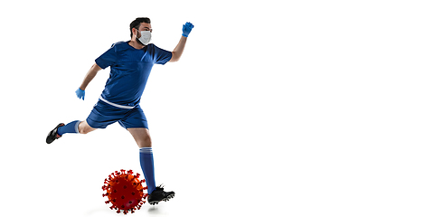 Image showing Sportsman kicking, punching coronavirus, protection and treatment concept, flyer