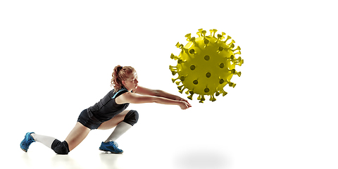 Image showing Sportswoman kicking, punching coronavirus, protection and treatment concept, flyer