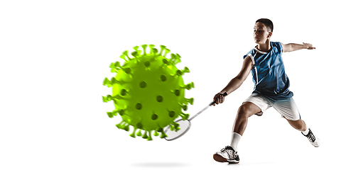 Image showing Sportsman kicking, punching coronavirus, protection and treatment concept, flyer