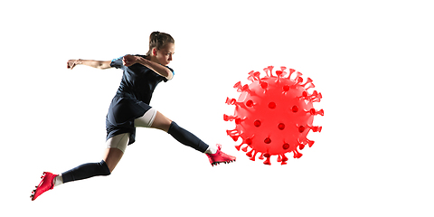 Image showing Sportswoman kicking, punching coronavirus, protection and treatment concept, flyer