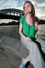 Image showing merry girl near Moscow-river at night