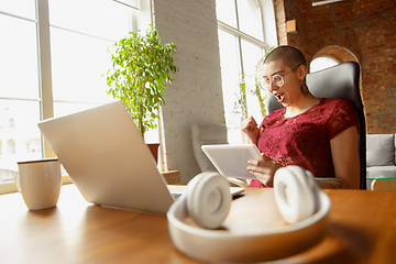 Image showing Woman working from home during coronavirus or COVID-19 quarantine, remote office concept