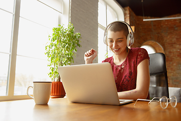 Image showing Woman working from home during coronavirus or COVID-19 quarantine, remote office concept