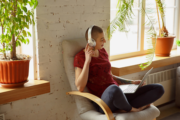 Image showing Woman working from home during coronavirus or COVID-19 quarantine, remote office concept