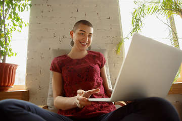 Image showing Woman working from home during coronavirus or COVID-19 quarantine, remote office concept