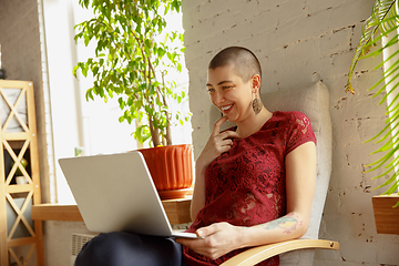 Image showing Woman working from home during coronavirus or COVID-19 quarantine, remote office concept