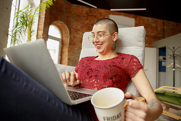 Image showing Woman working from home during coronavirus or COVID-19 quarantine, remote office concept