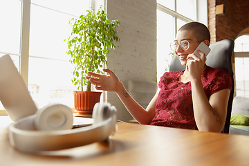 Image showing Woman working from home during coronavirus or COVID-19 quarantine, remote office concept