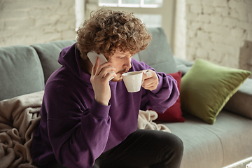 Image showing Man working from home during coronavirus or COVID-19 quarantine, remote office concept