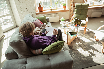 Image showing Man working from home during coronavirus or COVID-19 quarantine, remote office concept