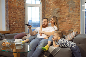 Image showing Mother, father and son at home having fun, comfort and cozy concept