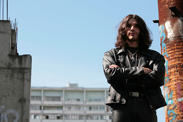 Image showing man in black leather cloth in gothic style