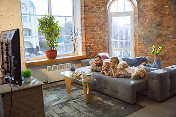 Image showing Mother, father and son at home having fun, comfort and cozy concept