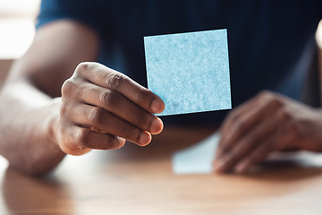 Image showing Close up of african-american male hands, working in office