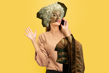 Image showing Magazine style collage with model outfit mixed of different eras. Copyspace.