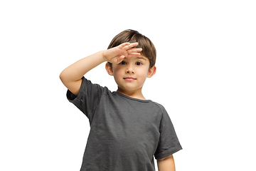 Image showing Happy caucasian little boy isolated on white studio background. Looks happy, cheerful, sincere. Copyspace. Childhood, education, emotions concept